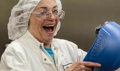 Worker Looking at Bump Cap With Excitement